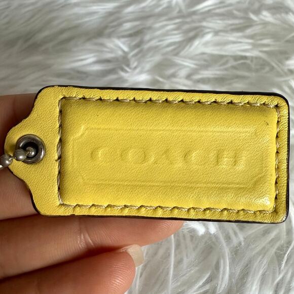 2" COACH Yellow Fob Bag Charm Hang tag Hangtag - Picture 1 of 2